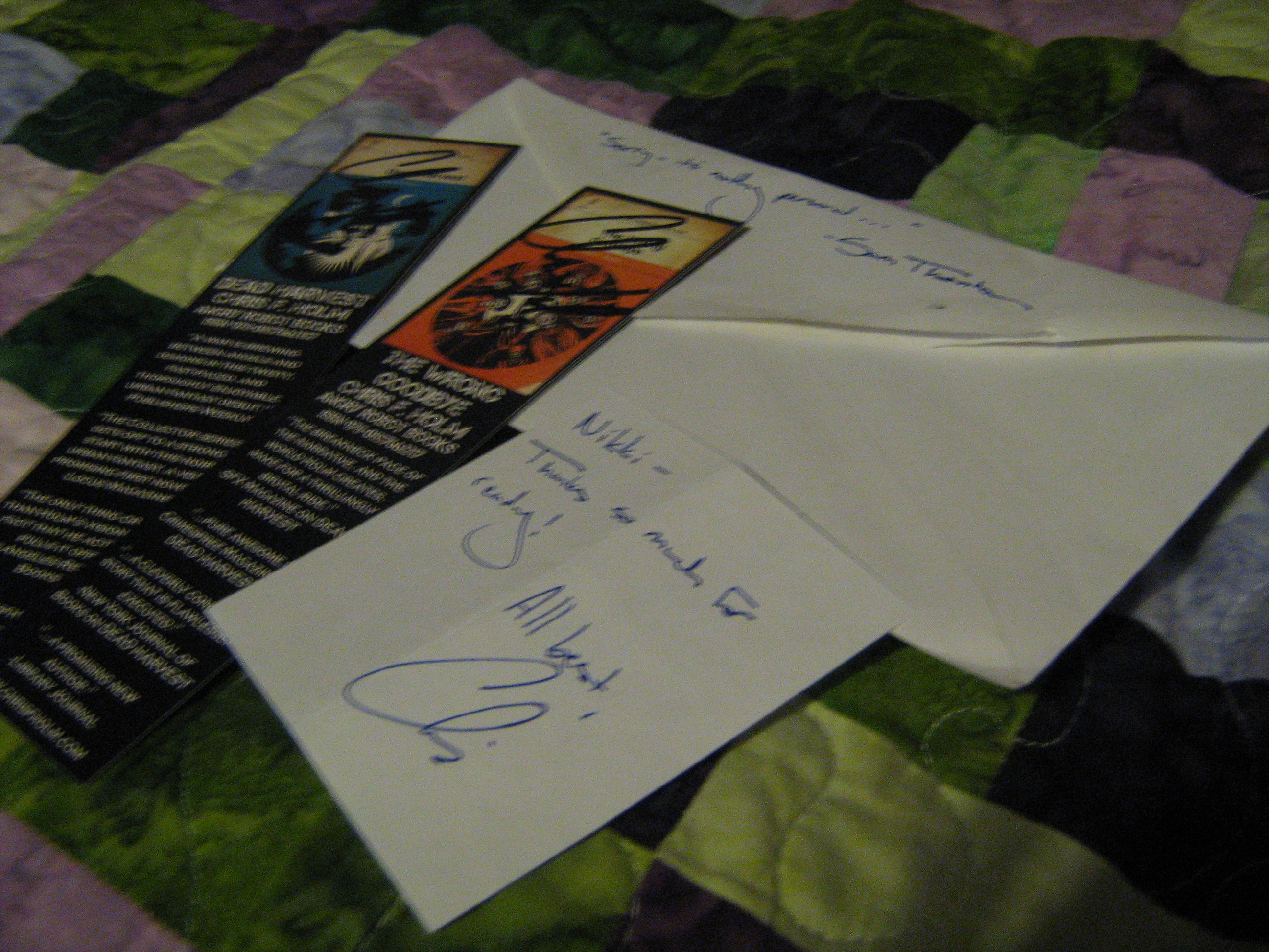 Photo of my signed bookmarks and the note they came with