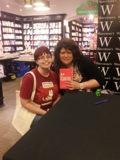 Photo of me and my dorky grin, with author Rainbow Rowell