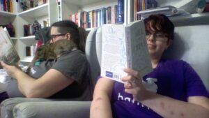 Photo of me and the wife reading, with bunny